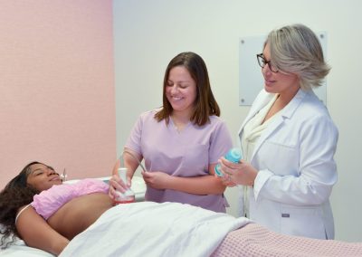 Therapist working with a client during a massage treatment in Houston